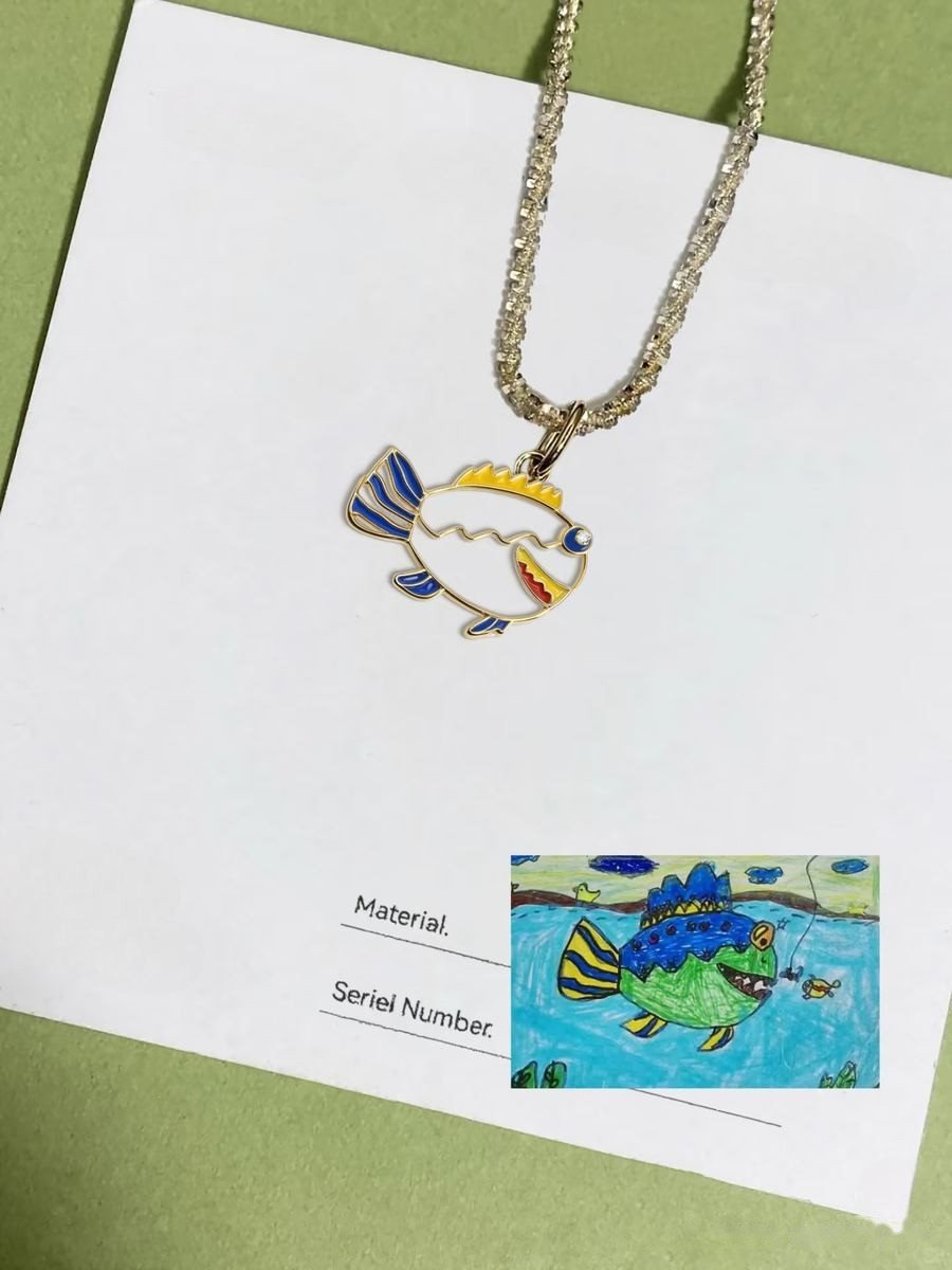 Blue fish painting as an enamel pendant